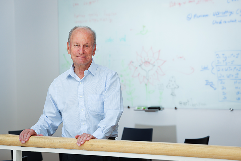 Steve Lisberger in front of white board