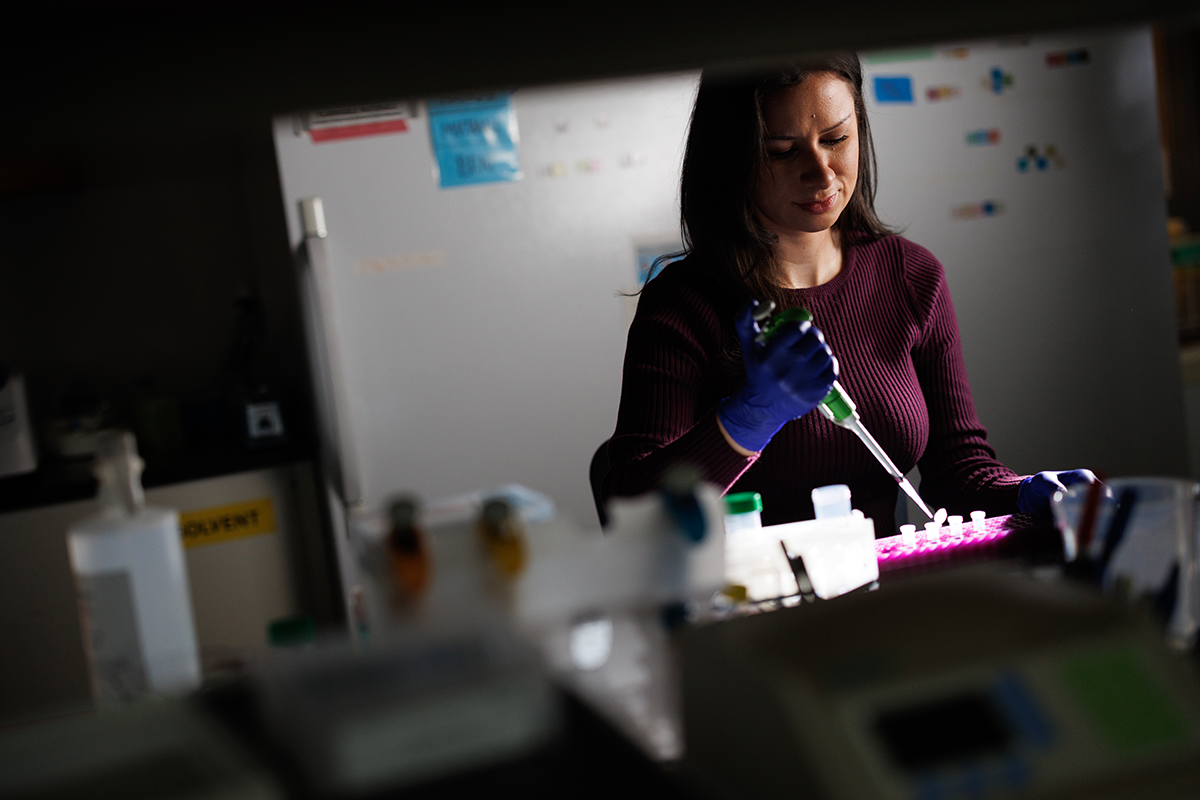 Seneca Oxendine pippetting in the lab