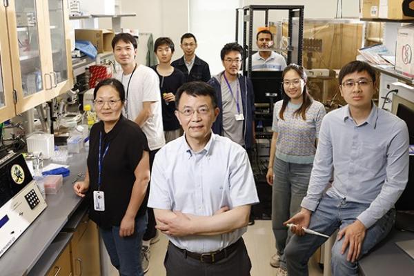 Ru-Rong Ji lab members standing in the lab