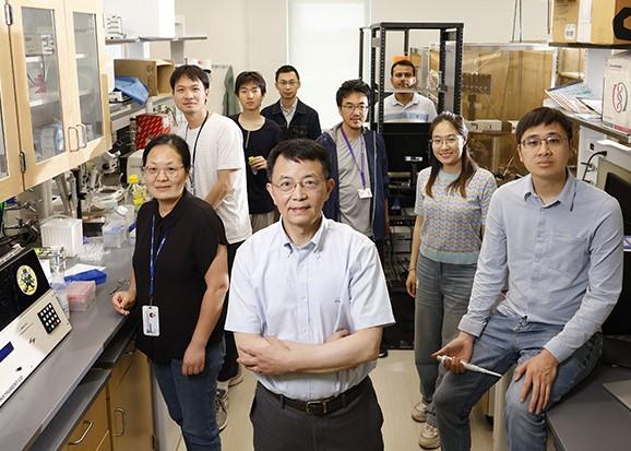 Ru-Rong Ji lab members standing in the lab