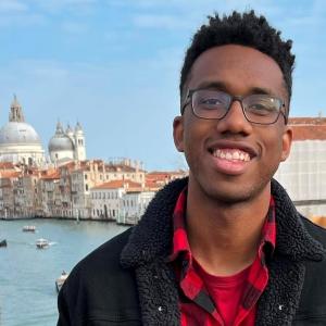 Lindsey Wilson standing on bridge in Venice Italy